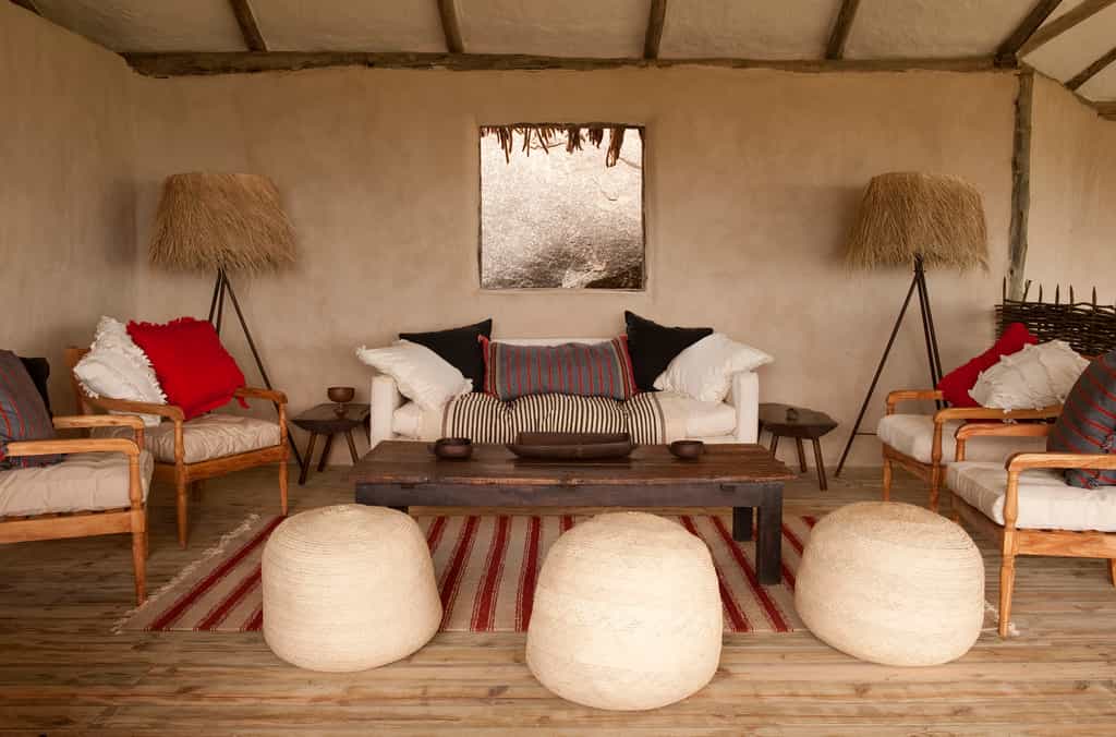 Styled by Jo Cooke, with furniture made entirely in Tanzania by her husband George, Lamai has a unique and substantial look - both fresh and warm.  The furniture was made by former street-boys who have been trained up by expert furniture-maker, George.