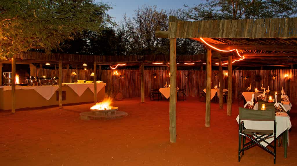 Round the fire place, dinner is served 
