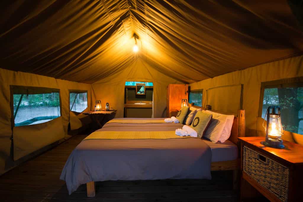 Tented suite interior with bathroom in the back