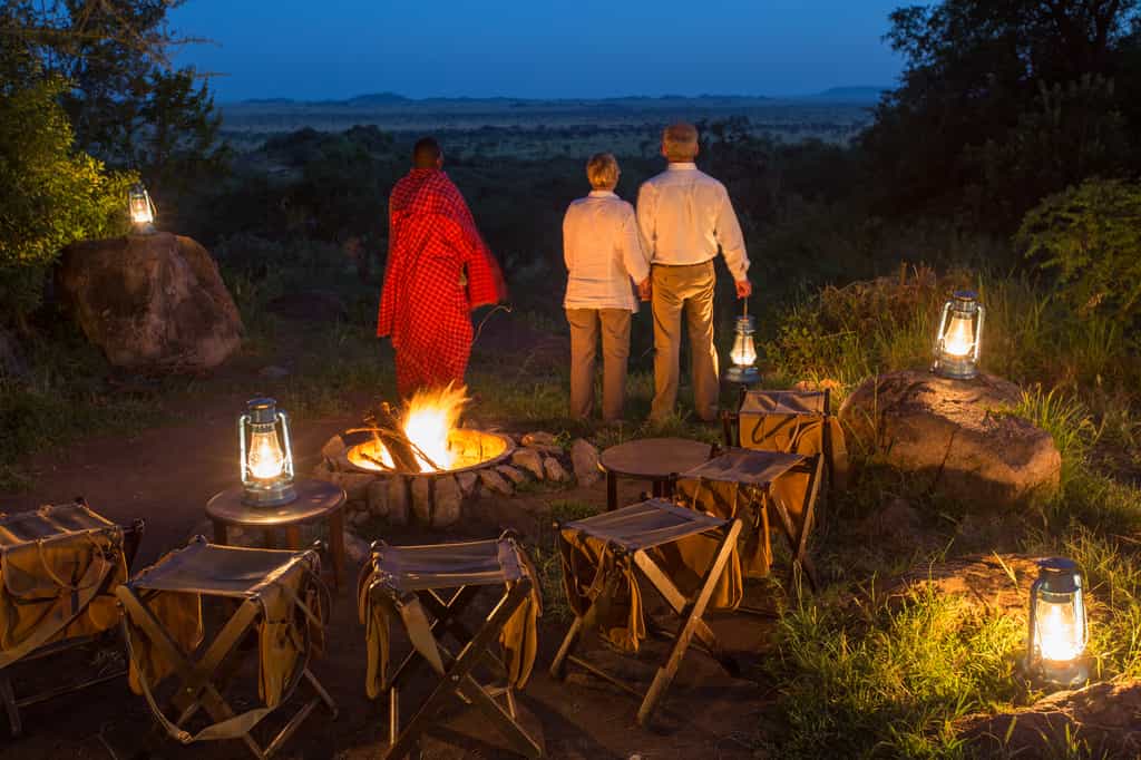 Enjoy the sounds of the African bush by the light of a campfire