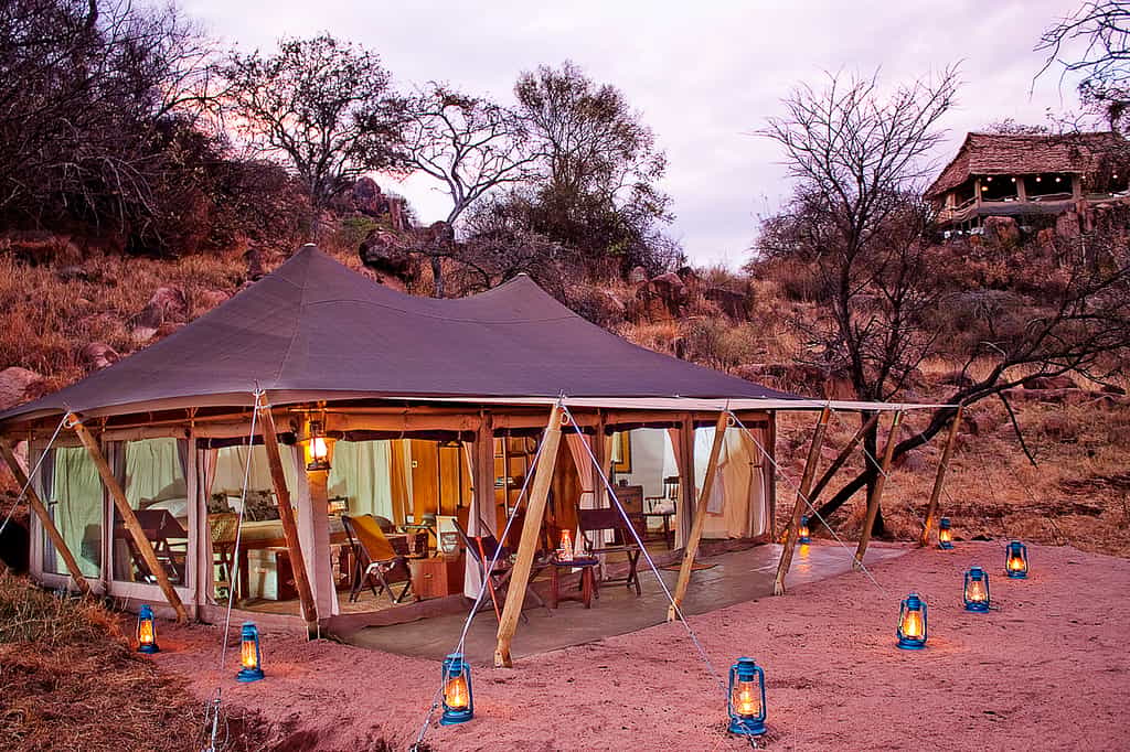 Exterior view of a double ensuite tent with verandah