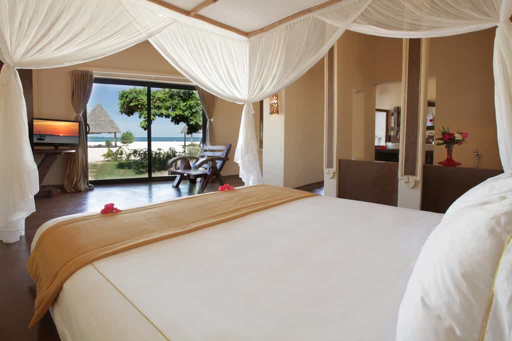 200sqm - Located on the beach,  one can choose between 3 types of villas: the African, the Arabian or the Italian. Each offers a large living room with a bathroom and ‘sale de bains’. The bedroom has a king sized bed with wardrobe area, and another room offers a separate bed with a bathroom. The exterior of the  villa consists of a wide veranda with Jacuzzi and a private tent on the beach. To pamper guests in the retreat,   a private butler service is guaranteed to satisfy every need.