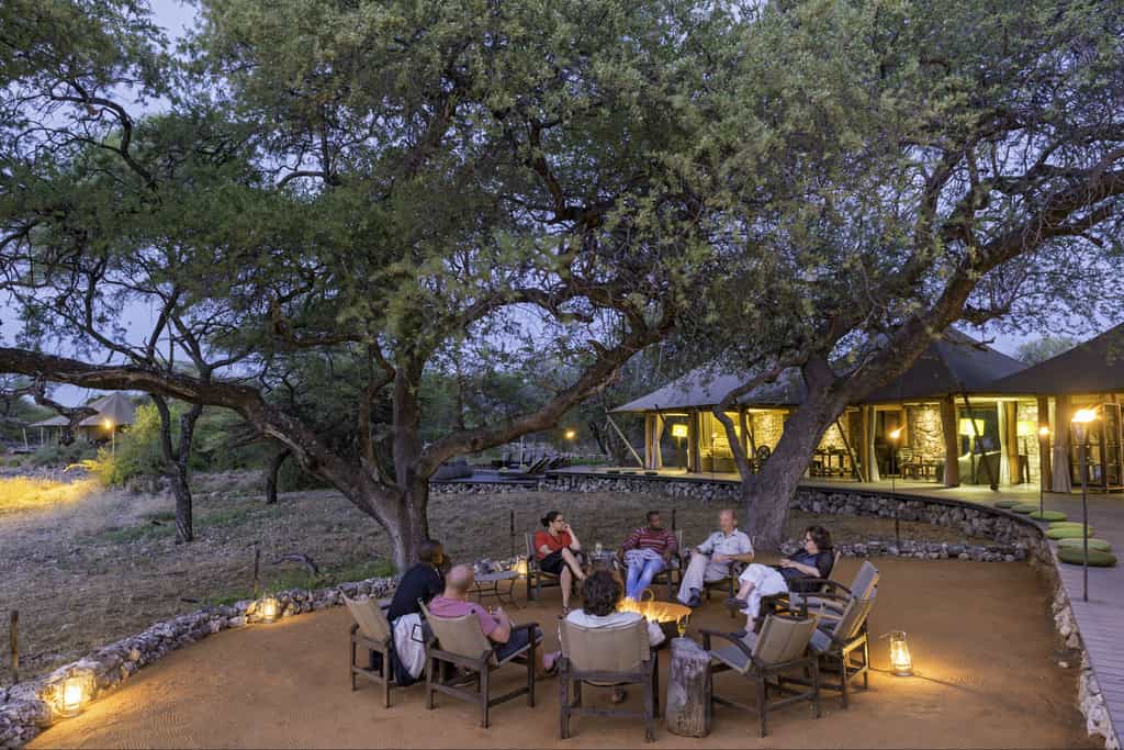 Guests enjoy sitting around the campfire