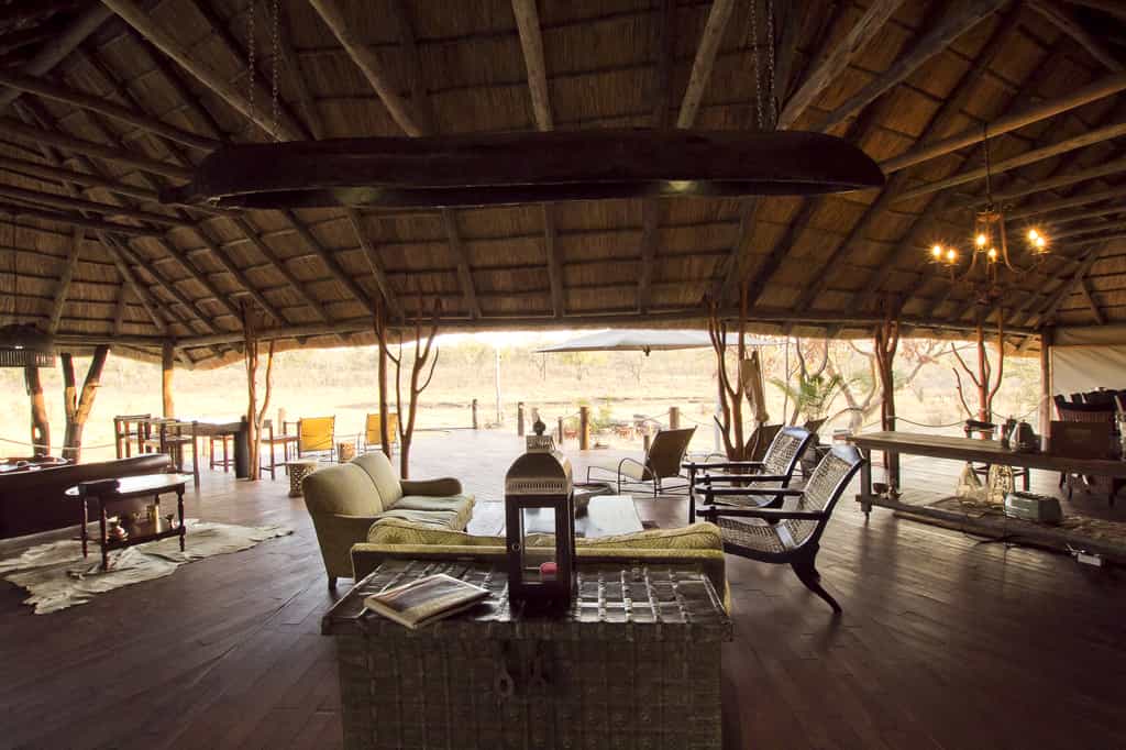 Main area consisting of lounge, outside deck with plunge pool and captains table