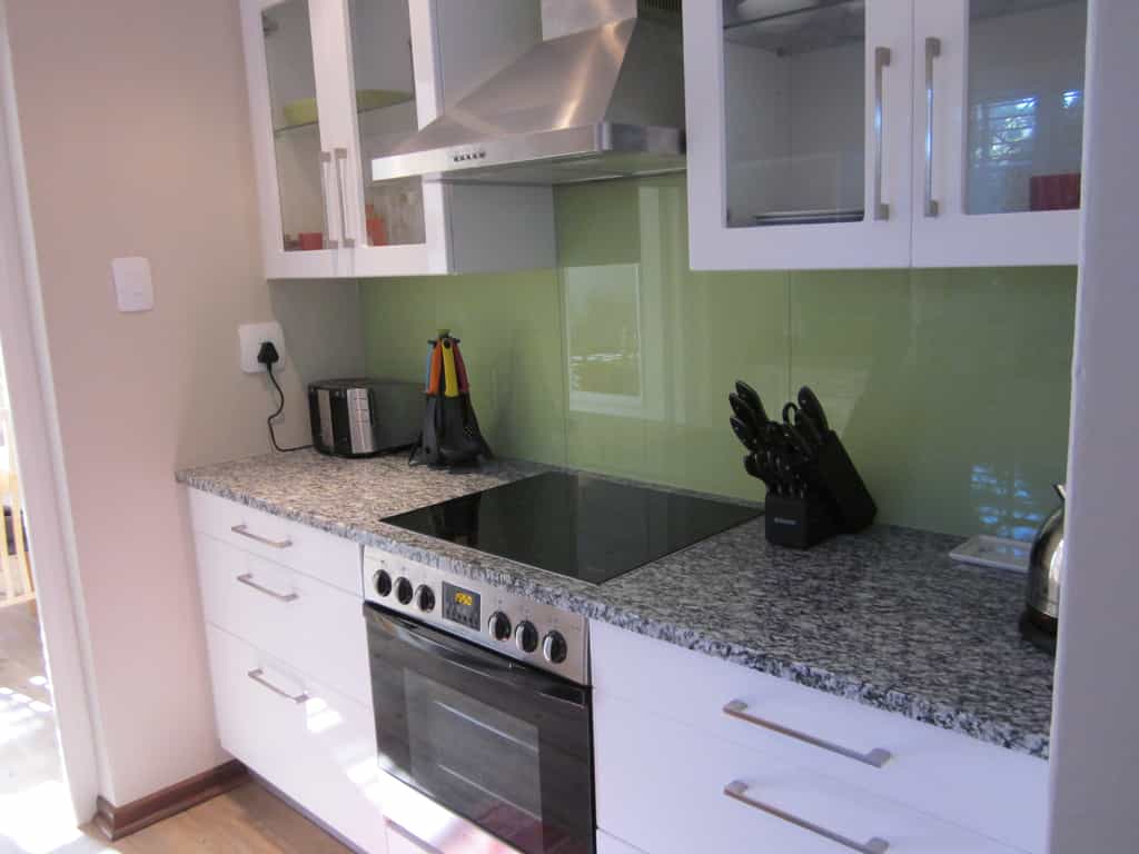 The kitchen in Quainton cottage includes an electric stove