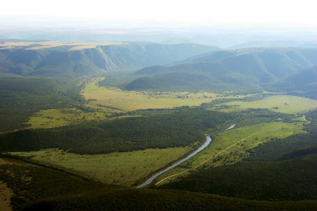 The site is beautiful alongside the river and with views across the plains to the bush beyond. 