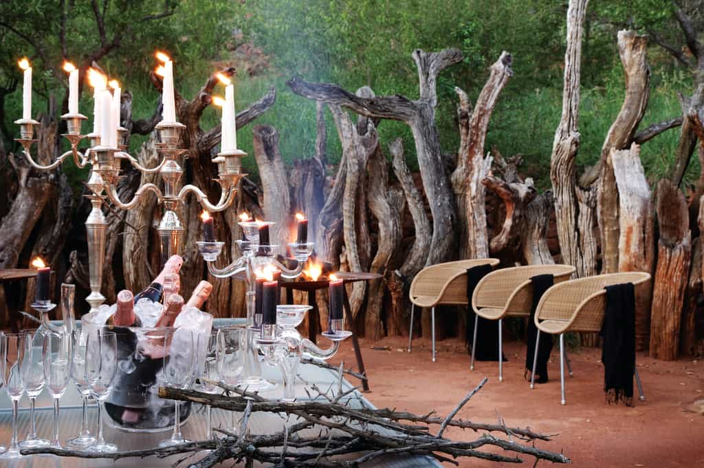 Outdoor dining in our Boma allows our guests to experience a true South African Braai.