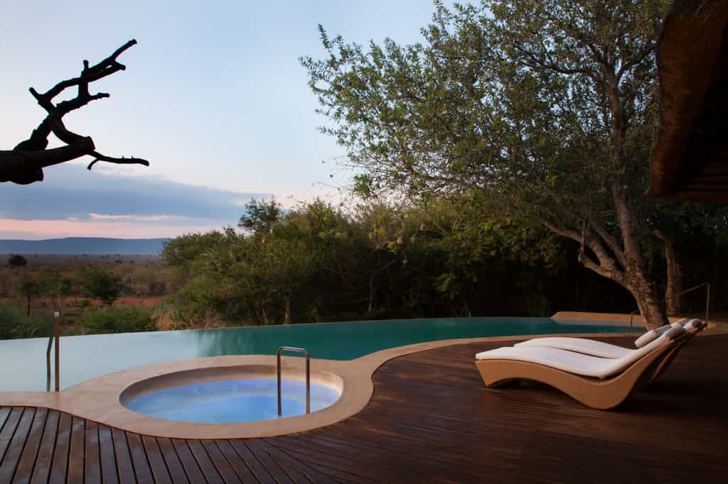 Pool with a view and a hot outdoor jacuzzi tub
