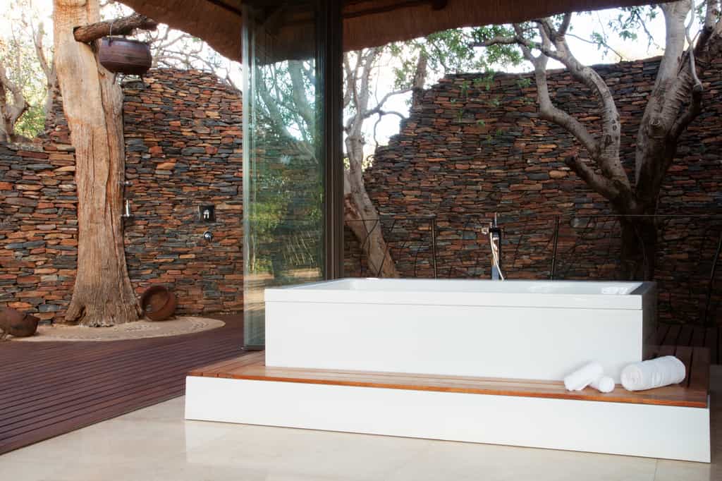 Unwind in our rim flow bath or enjoy an exhilarating outdoor shower 