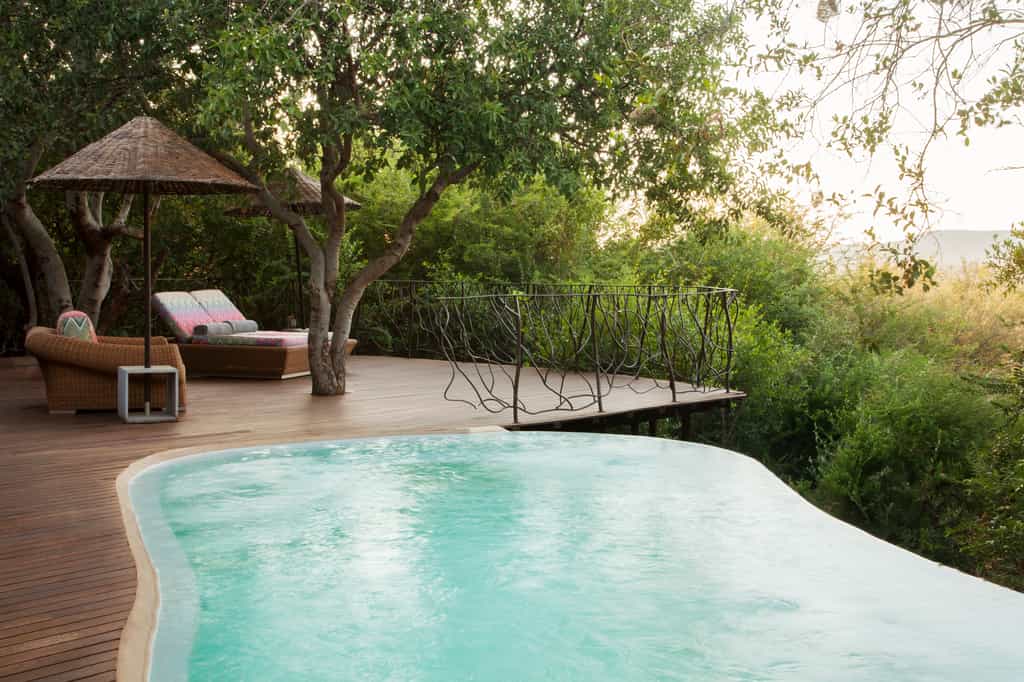 Private pool deck with loungers 