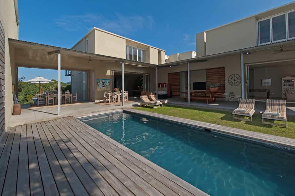 Swimming pool area with the lounges and seating areas