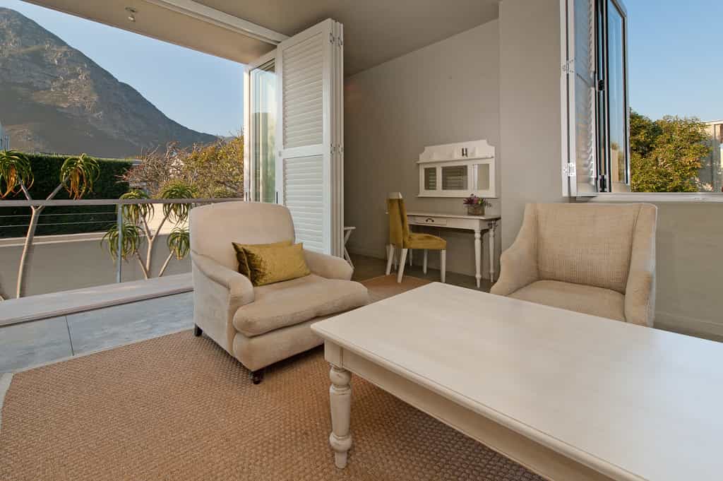Beautiful stacking windows & doors that open onto one of the Olive room balconies