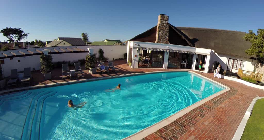 Kids swimming in solar heated pool