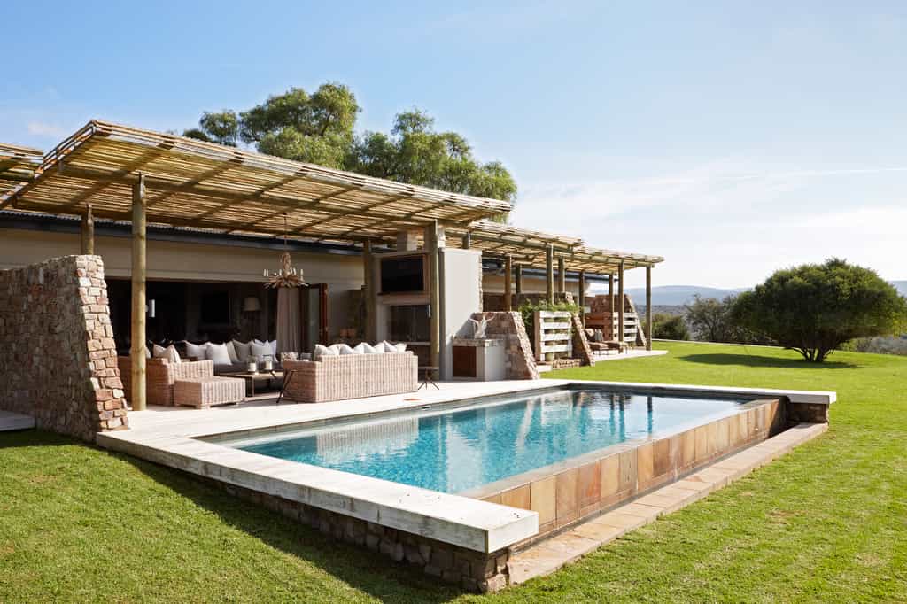 View wildlife wandering by from the heated rim-flow pool 
