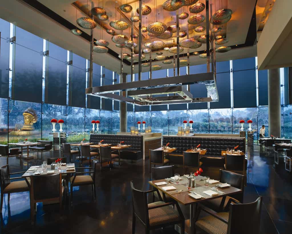 It’s the all-day dining restaurant of The Leela Palace New Delhi. Designed like a glasshouse, Qube adds a contemporary touch to its ambience, giving it an alfresco feel even within its cool comforts. Adding to the experience of dining here is watching the chefs at their live stations, creating exotic dishes like Asian wok-fried specialties, pizzas and pastas.