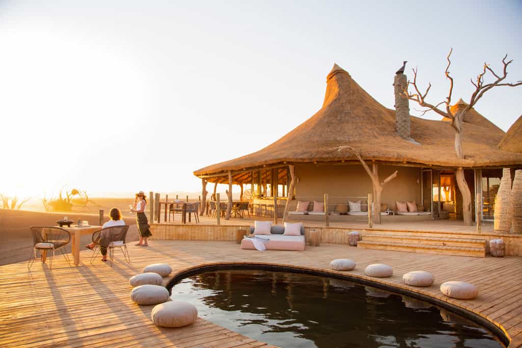 The pool deck offers an elegant and tranquil haven from the desert heat