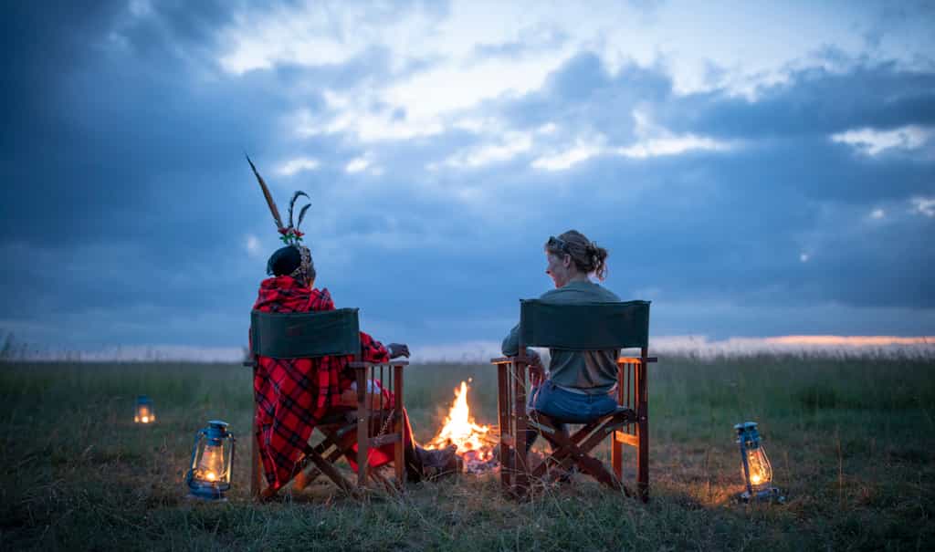 Enjoying sundowners by the fire