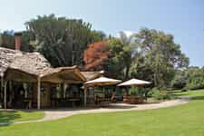 Overlooking the water pond, the lawn is a great outside dining area with a perfect view of the sanctuary