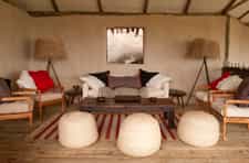 Styled by Jo Cooke, with furniture made entirely in Tanzania by her husband George, Lamai has a unique and substantial look - both fresh and warm. The furniture was made by former street-boys who have been trained up by expert furniture-maker, George.