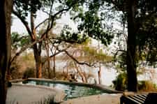Cool off in the pool and enjoy the views over the Rufiji River from your own private camp.