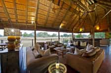 Camp lounge with a view of the waterhole