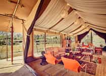 Each of our campsites has a reception tent Meet fellow guests in the lobby, which is a perfect place to share stories and experiences. Turn to our Guest Relations Executive, who will help address your every need Confer with our In-House Tour Manager to customise the daily itinerary to include your special interests Shop for the best of regional handicrafts at the boutique Enjoy undisturbed Wi-Fi connectivity Connect your iPods to the docking station and groove to your choice of music Have some family fun with indoor board games Explore our in-house library