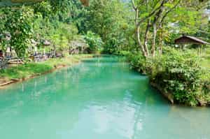 Visit Phu Kham Cave and the blue lagoon