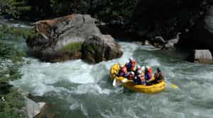 Navigate rapids on the Pho Chu river from Punakha
