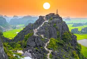 Climb the 500 steps to the Mua Cave viewpoint