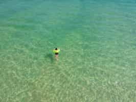Swim in the crystal clear waters of Corumbau