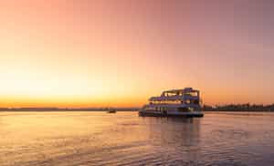 Take a sunset cruise on the Zambezi Explorer