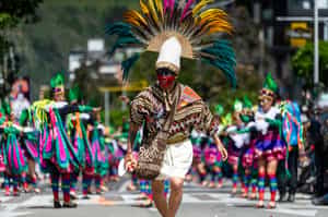 Dive into Pasto's Día de los Negros paint parade