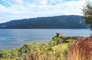 Cruise Loch Ness past Urquhart Castle