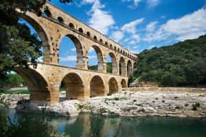 Stand beneath the Pont du Gard