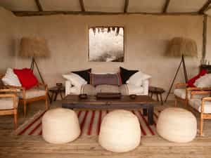Styled by Jo Cooke, with furniture made entirely in Tanzania by her husband George, Lamai has a unique and substantial look - both fresh and warm.  The furniture was made by former street-boys who have been trained up by expert furniture-maker, George.