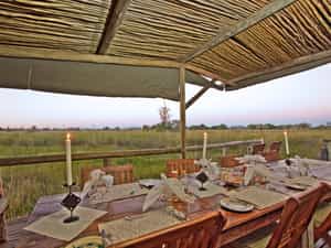 Meals are enjoyed on the deck with spectacular views across the floodplains to distant island forests.