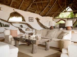Perched on the banks of the Rufiji River, the main lounge is the perfect place to enjoy watching lazy hippos and crocs with a good book to keep you company.