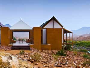 An eco-friendly lodge built on a sweeping ridge and opening up to breathtaking views of the Kunene River