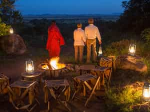 Enjoy the sounds of the African bush by the light of a campfire