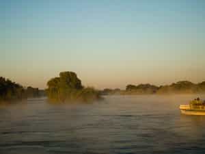 Explore the Upper Zambezi and surrounding Islands on an early morning Sunrise Boat Cruise