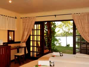 Chalet by the Zambezi River, ensuite bathroom, mosquito nets, fan, tea & coffee facilities, fridge, safe