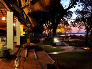 The main Lodge is a charming thatched structure, consisting of a lounge, dining room and bar area. This offers fantastic views of both the river and a nearby waterhole, which attracts game throughout the year