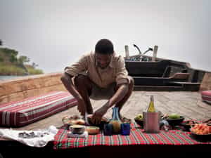 The journey is always part of the destination. After landing at the Mahale airstrip, you board the dhow for a gentle 90min cruise down the lakeshore, with a picnic spread and a glass of chilled wine in hand.