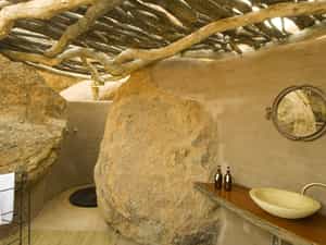 Inside the dome shaped space, you feel like entering a secluded cave and becoming one with the landscape. 