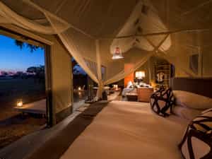 Tent bedroom with evening views