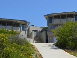 Two identical units interlinked with deck and pool area