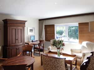 Located on the 1st Floor, geusts are able to relax in a comfortable setting. A Desktop Computer with Internet as well as a printer is available to guests. A small library is also available