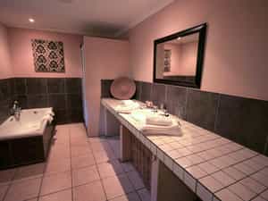 Big bathroom with separate shower and bath tub.