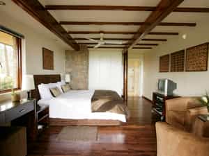 All four luxury B&B rooms are on the ground floor and have en-suite bathroom, DSTV, DVD player, double bed, desk, 2 comfortable chairs, private patio, own entrance.