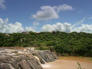 The lodge is set along a ridge above the Mkuze River as it falls. 